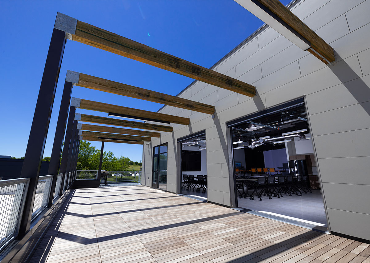 Setpoint Mechanical outside patio area with large beams