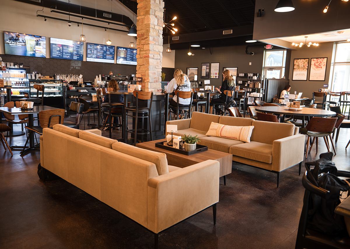Vibrant Coffee House dining area with couches